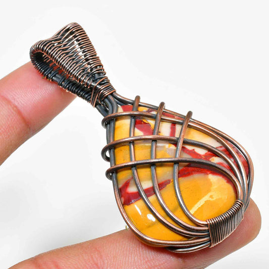 Ember’s Embrace – Carnelian Copper Pendant