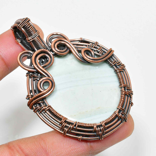 Amara’s Touch – Aquamarine Copper Pendant