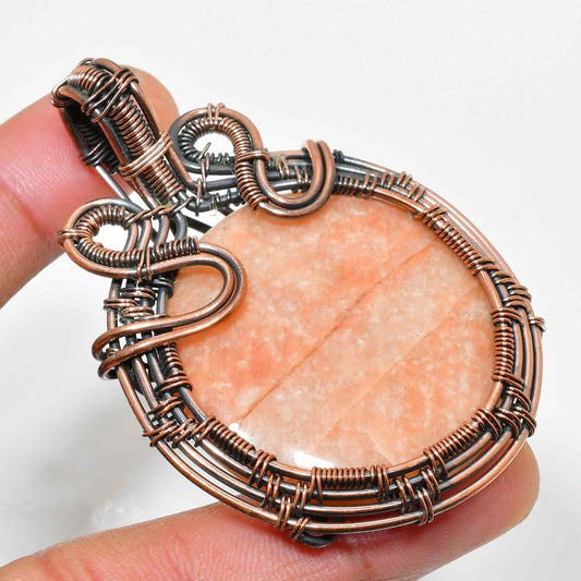 Ember Embrace – Orange Selenite & Oxidized Copper Pendant