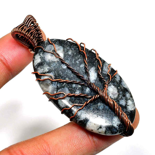 Ember’s Embrace – Black & White Stone Copper Pendant