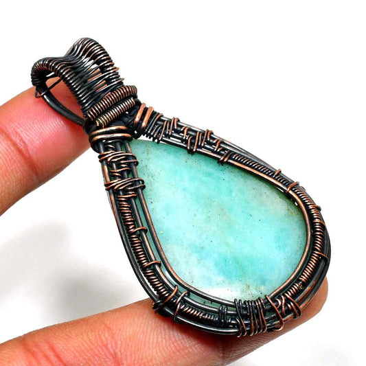 Gaia’s Embrace – Copper Wrapped Stone Pendant