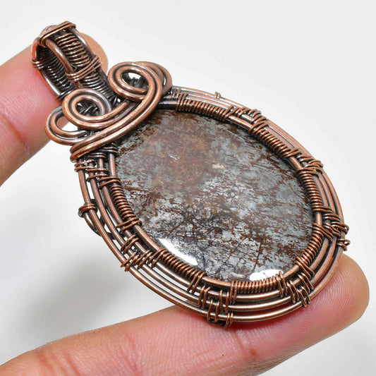 Terra’s Embrace – Copper-Wrapped Stone Pendant