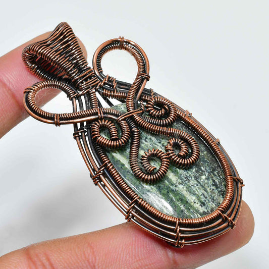 Gaia’s Embrace – Green Stone Copper Pendant