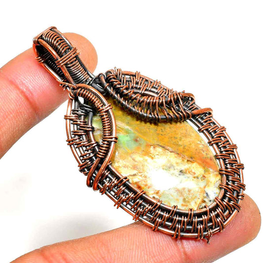 Gaia’s Embrace – Copper-Wrapped Healing Stone Pendant