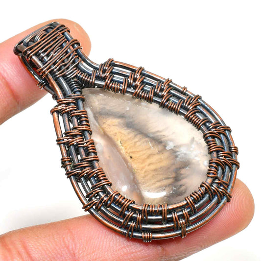 Gaia’s Glow – Clear Quartz Copper Pendant