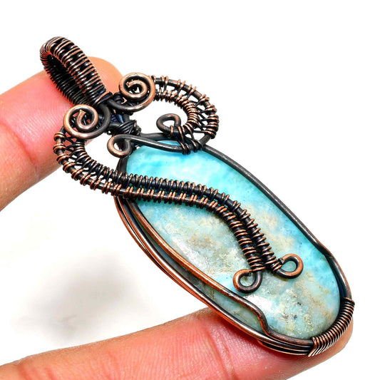 Ember’s Echo – Larimar Copper Pendant