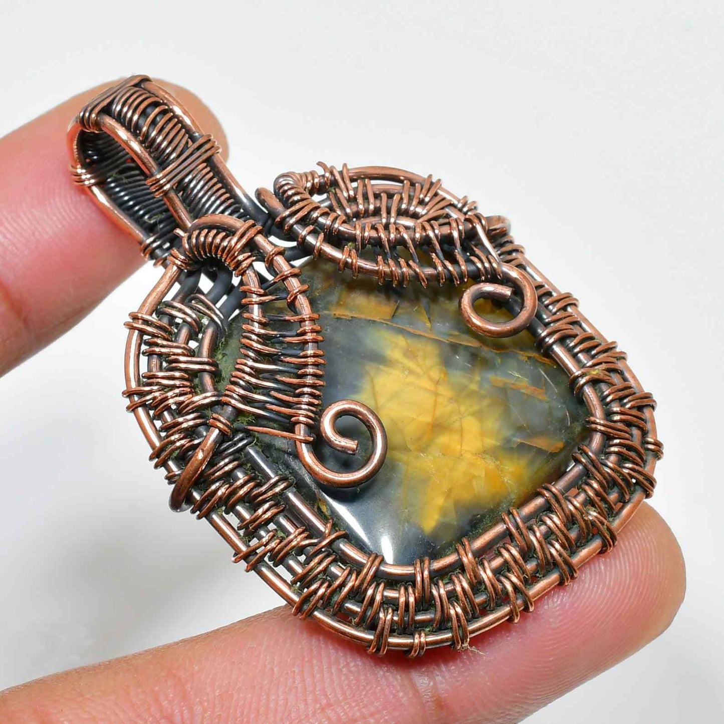 Courage’s Embrace – Tigers Eye Copper Pendant