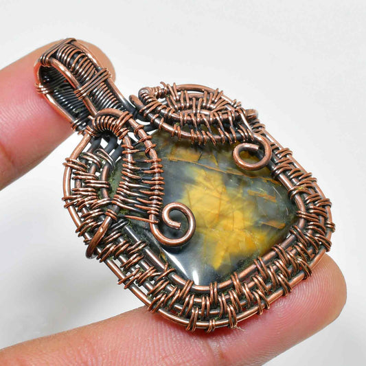 Courage’s Embrace – Tigers Eye Copper Pendant