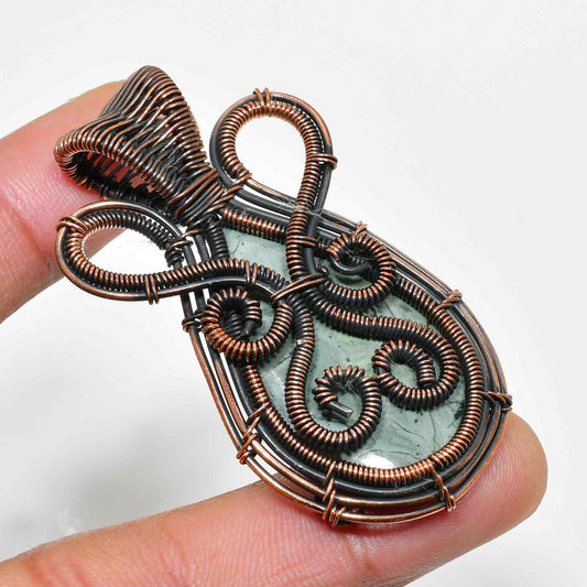 Celestia’s Embrace – Amethyst & Oxidized Copper Pendant