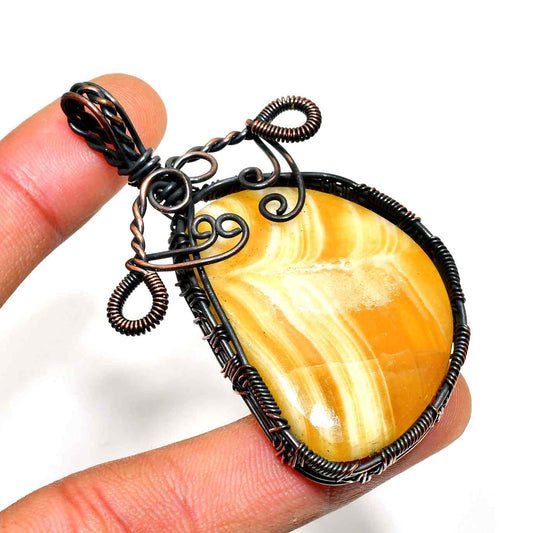 Terra’s Embrace – Golden Onyx Copper Pendant