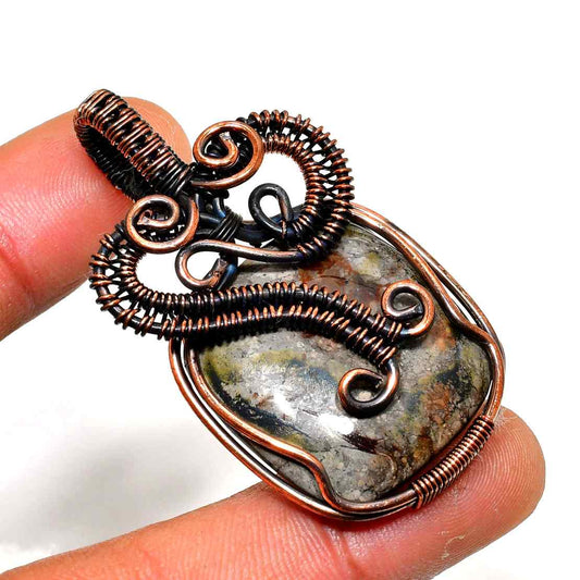 Gaia’s Embrace – Natural Stone & Oxidized Copper Pendant