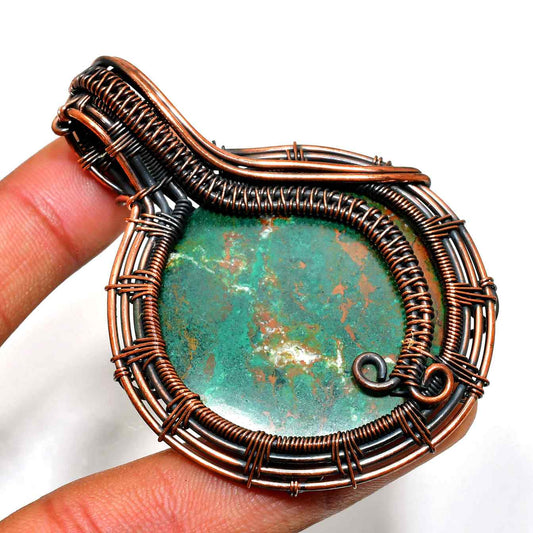 Gaia’s Embrace – Copper-Wrapped Green Stone Pendant