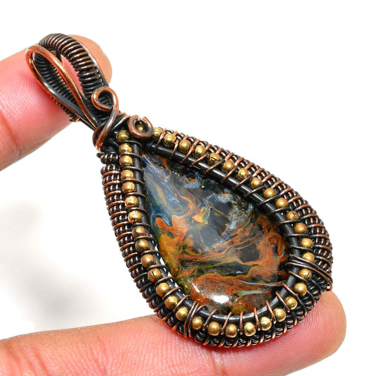 Obsidian’s Grace – Copper-Wrapped Grounding Pendant