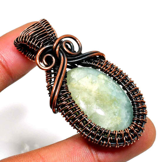 Celestial Embrace – Aquamarine & Oxidized Copper Pendant