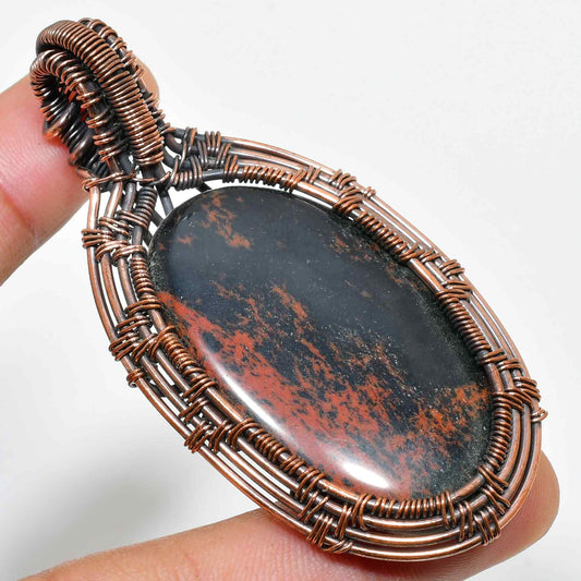Terra’s Embrace – Copper-Wrapped Stone Pendant