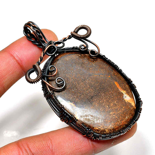 Mystic Glow – Wire-Wrapped Goldstone Pendant