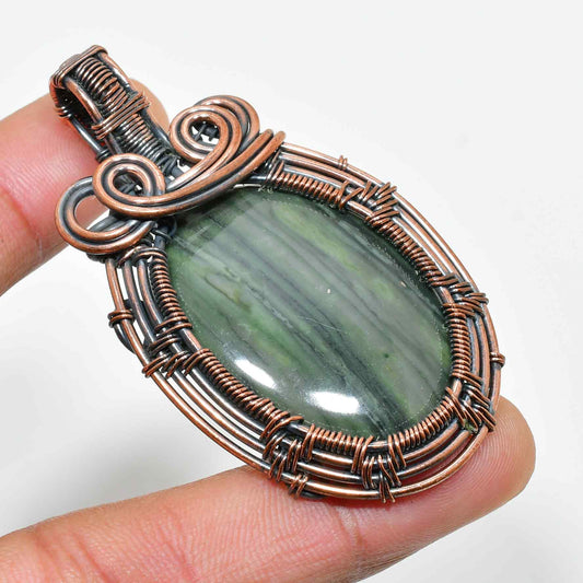 Gaia’s Balance – Green Stone & Oxidized Copper Pendant