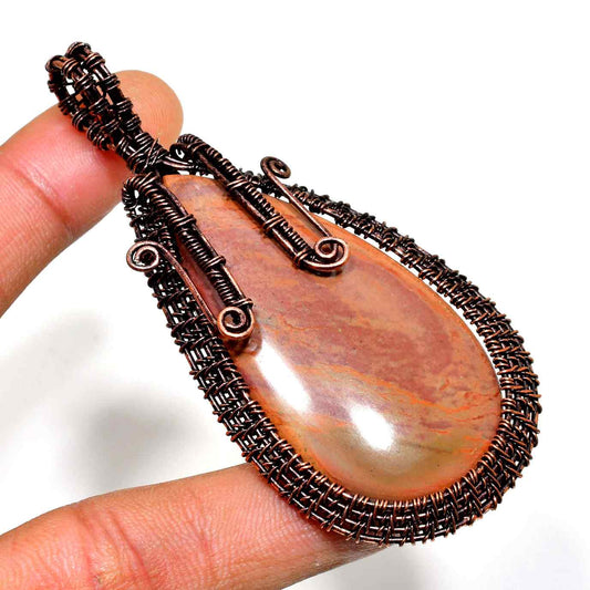 Earth’s Embrace – Copper-Wrapped Natural Stone Pendant