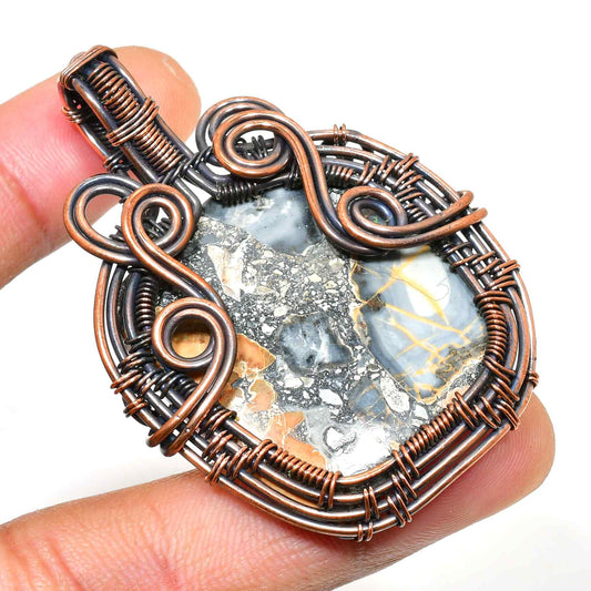 Gaia’s Embrace – Oxidized Copper Stone Pendant