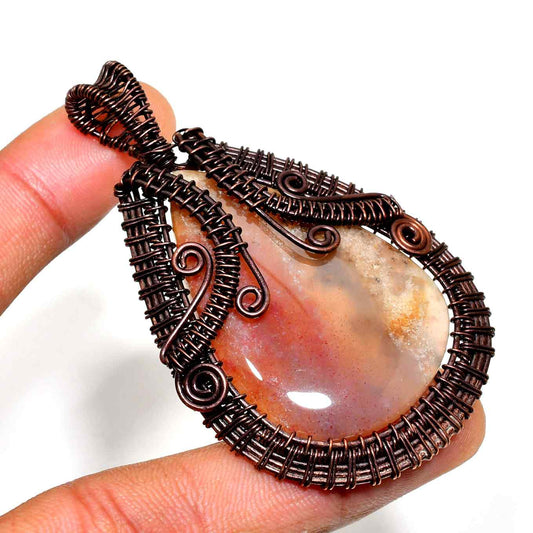 Ember’s Embrace – Carnelian Copper Pendant