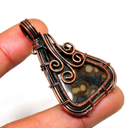 Gaia’s Embrace – Copper-Wrapped Natural Stone Pendant