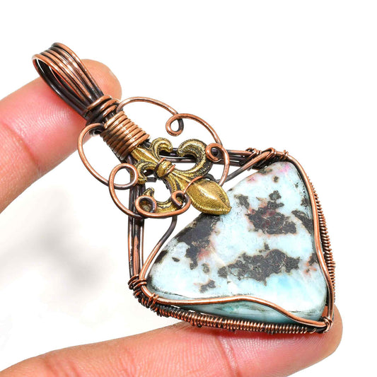 Ocean’s Embrace – Antique Copper Larimar Pendant