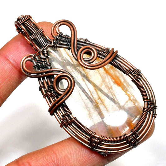 Aurora’s Grace – Copper-Wrapped Quartz Pendant