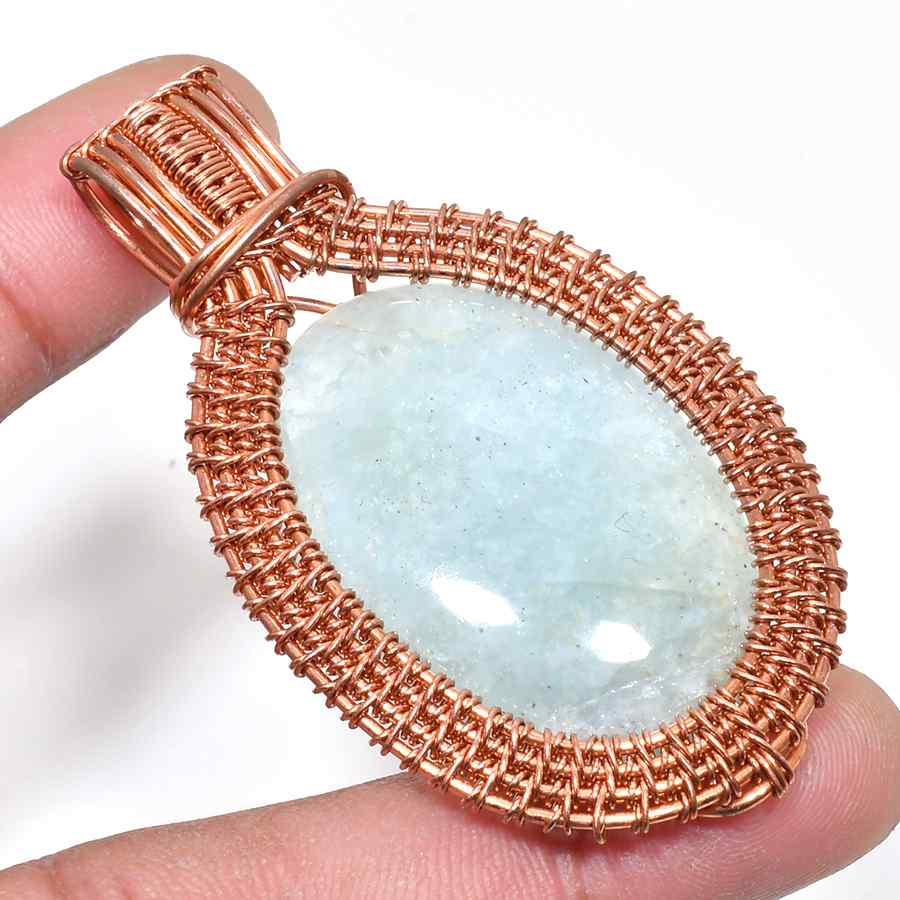 Ocean’s Embrace – Aquamarine Copper Pendant