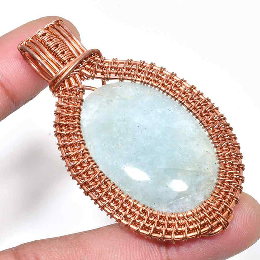 Ocean’s Embrace – Aquamarine Copper Pendant