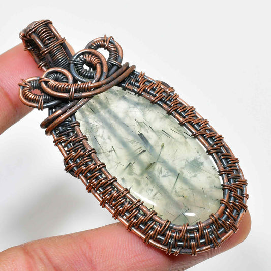 Aurora’s Radiance – Copper-Wrapped Quartz Pendant