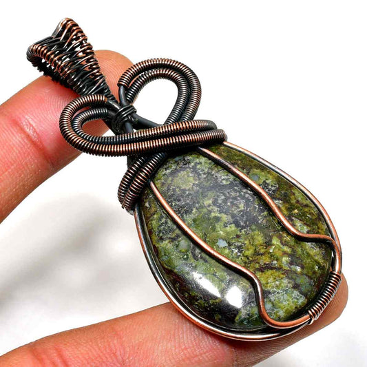 Gaia’s Embrace – Copper-Wrapped Greenstone Pendant