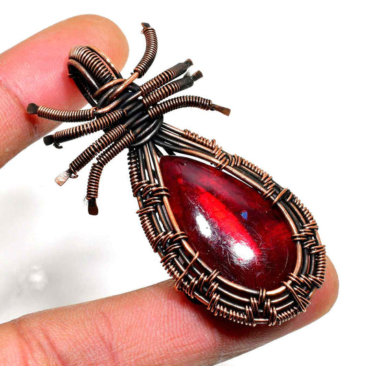 Ember’s Embrace – Garnet Copper Pendant
