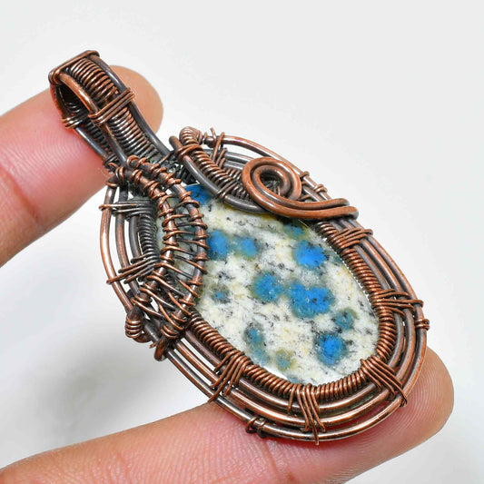 Gaia’s Embrace – Copper-Wrapped Stone Pendant