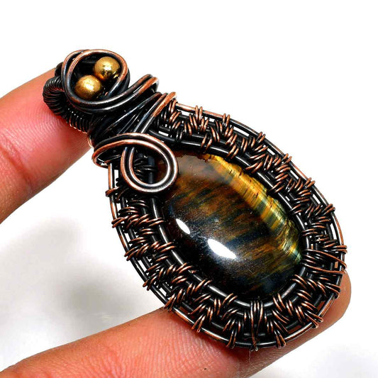 Terra’s Guardian – Tiger’s Eye Copper & Black Wire Pendant