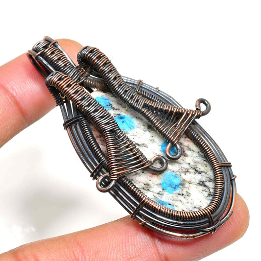 Artisan’s Embrace – Copper-Wrapped Natural Stone Pendant