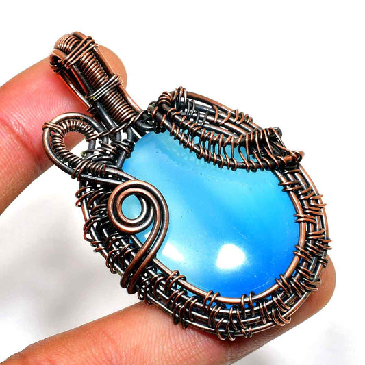 Azure’s Embrace – Blue Agate Copper Pendant