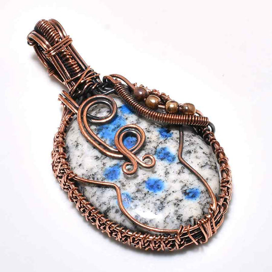 Ember’s Embrace – Copper-Wrapped Earthstone Pendant
