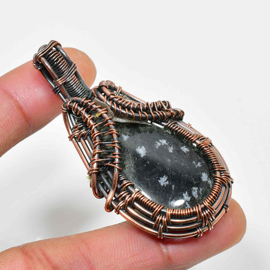 Terra’s Shield – Snowflake Obsidian Copper Pendant
