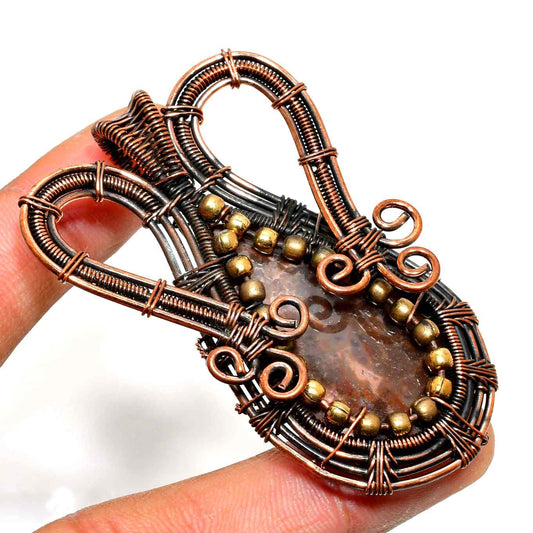 Gaia’s Embrace – Natural Stone Wire-Wrapped Pendant