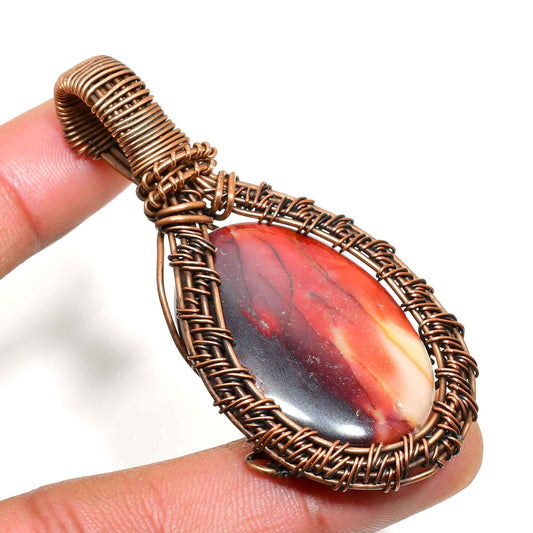 Ember’s Embrace – Red Agate Copper Pendant