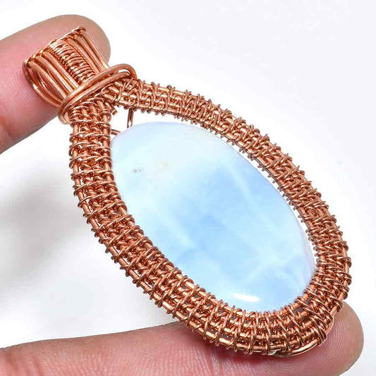 Celeste’s Whisper – Larimar Copper Serenity Pendant