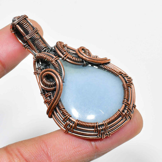 Ocean’s Embrace – Aquamarine Copper Pendant