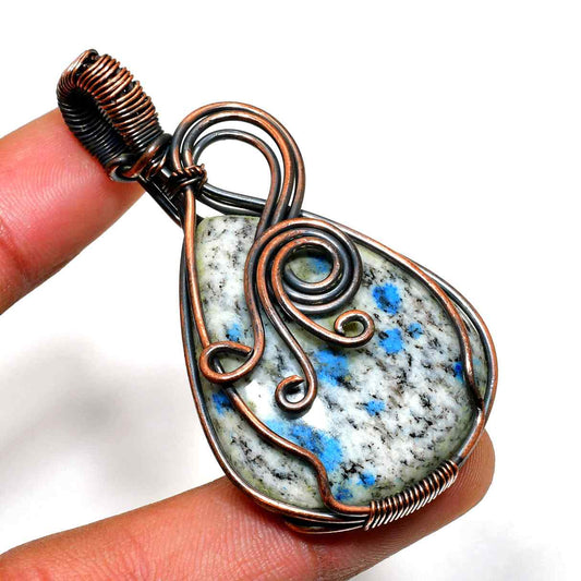 Serenity’s Embrace – Copper-Wrapped Healing Stone Pendant
