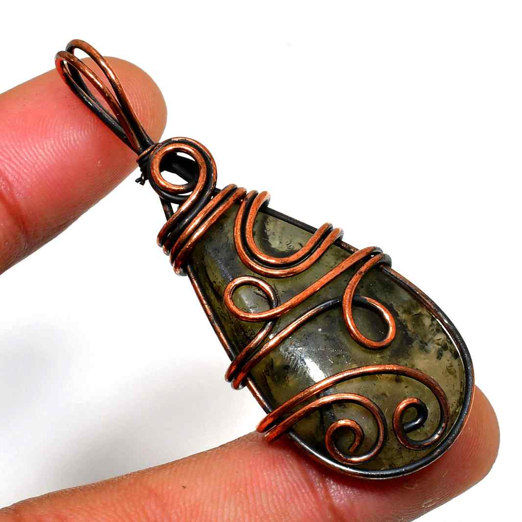 Clarity’s Crown – Quartz & Oxidized Copper Pendant