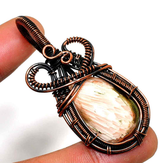 Celestial Embrace – Copper-Wrapped Crystal Pendant