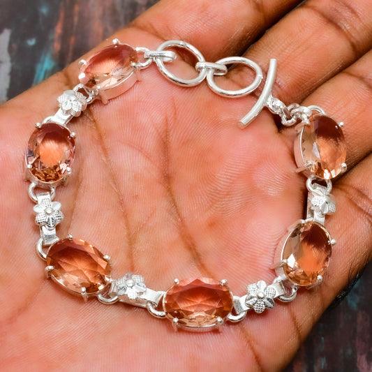 Aurora’s Embrace – Peach Moonstone & Sterling Silver Bracelet