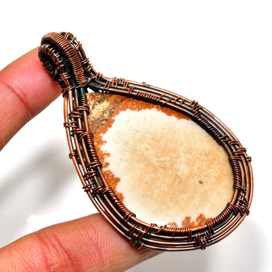 Terra’s Embrace – Copper-Wrapped Stone Pendant
