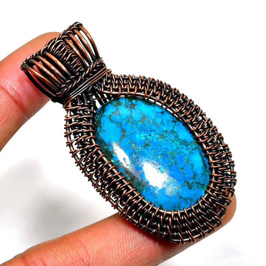 Azure’s Embrace – Turquoise Copper Pendant