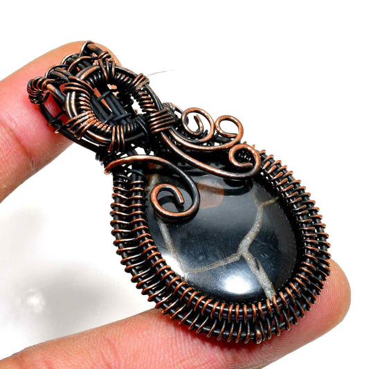 Midnight’s Embrace – Oxidized Copper & Black Stone Pendant