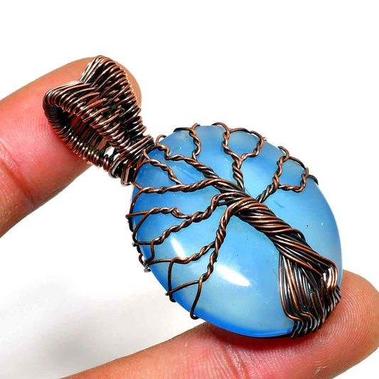 Ocean’s Embrace – Blue Agate Copper Pendant
